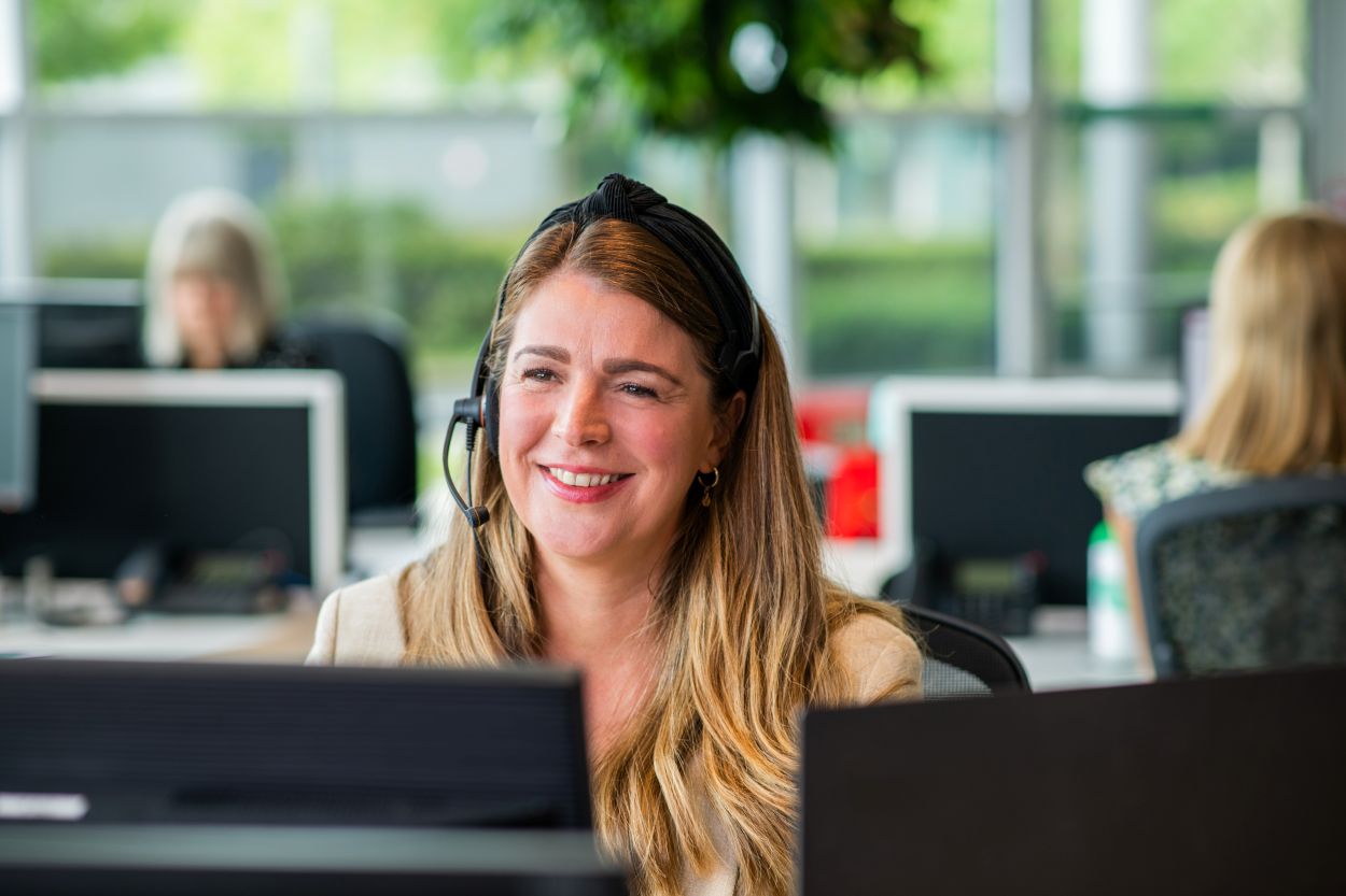 lady smiling with headset